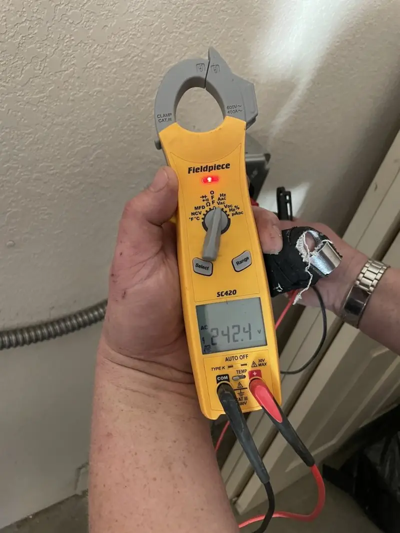 Voltage testing with clamp meter during Electrical Installation Services in East San Gabriel